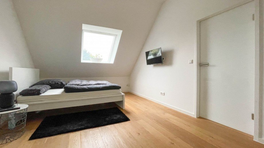 Schlafzimmer im Spitzboden Maisonettewohnung D�sseldorf